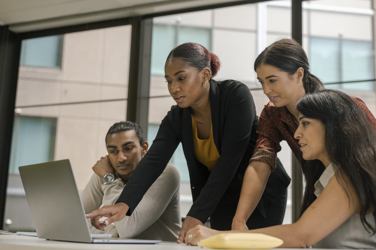 A team of people collaborate on a project