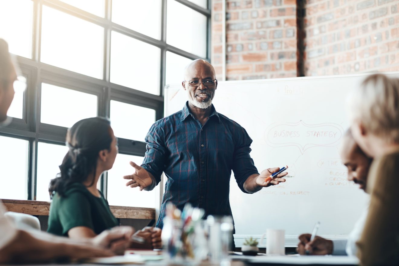 A man trains a room of people