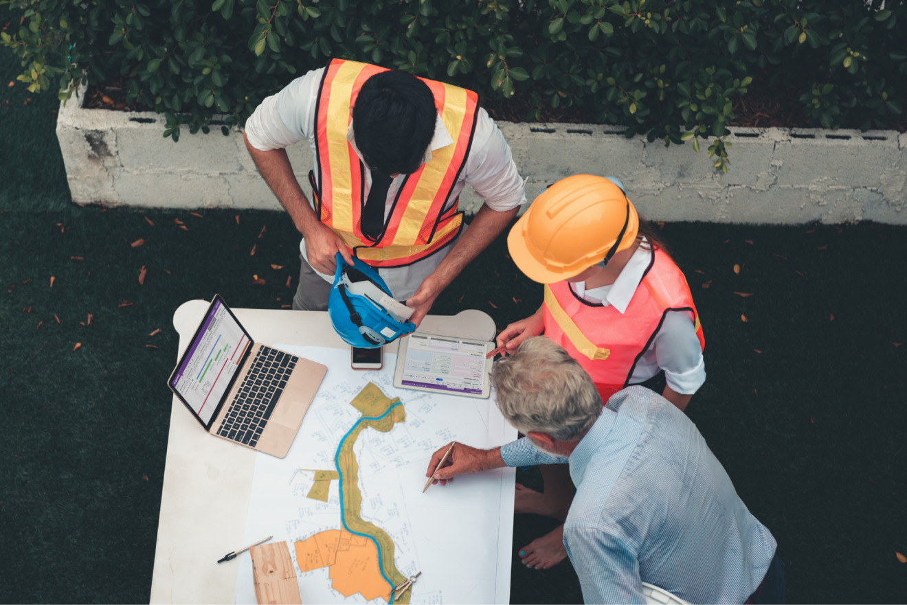 Three people use Quickbase in the field